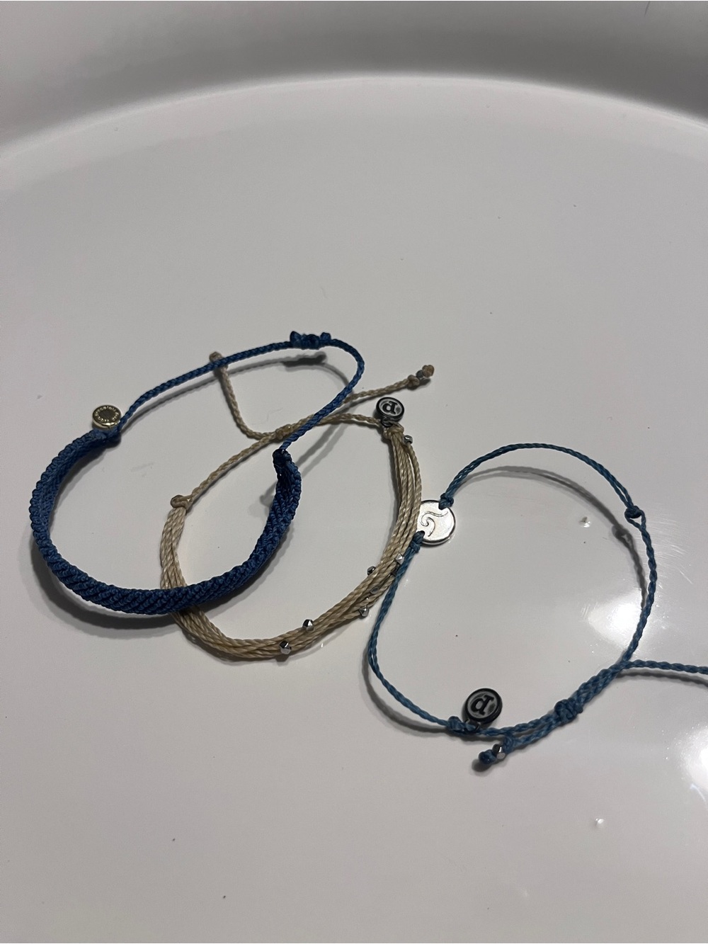 Pura Vida stack Set of Three Braided Cord Bracelets in Blue and Beige